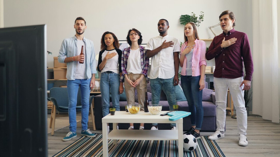 group watching tv show