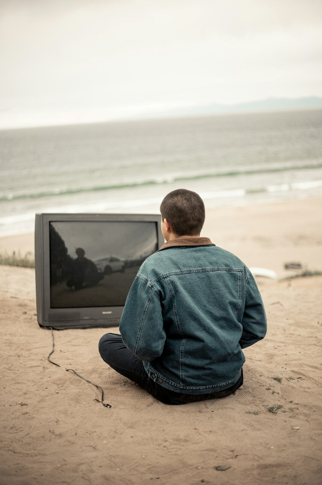 person watching old tv