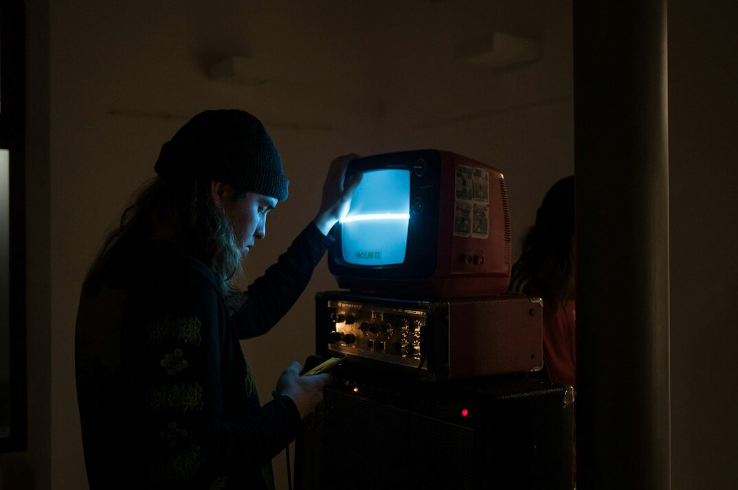 person watching retro tv